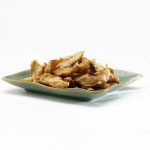 dried asian pears on a green plate